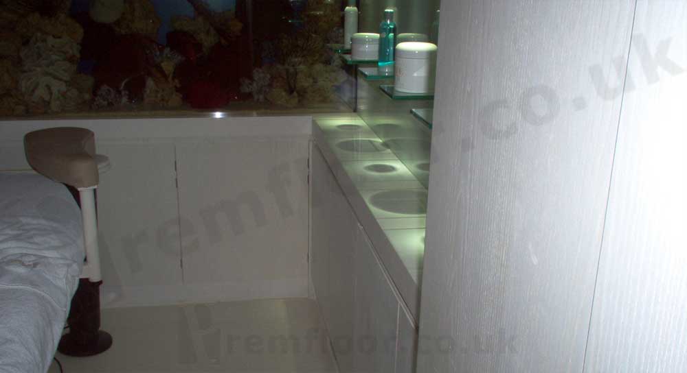 Altro TerrazzoLite EP floor in treatment room with fish tank and beds